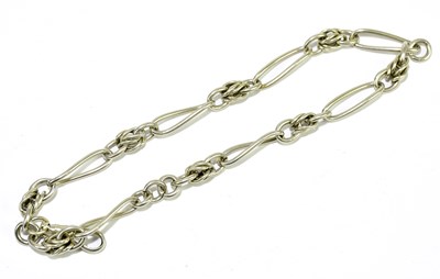 Lot 203 - A silver open link bracelet, length 18cm,...