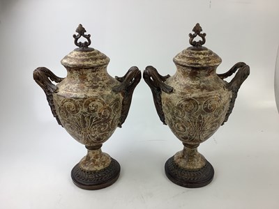 Lot 2095 - A pair of decorative twin handled pedestal...