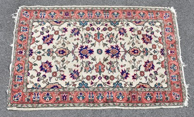 Lot 2370 - An Eastern style carpet with floral decoration...