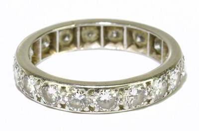 Lot 26 - A white gold diamond set full eternity ring...