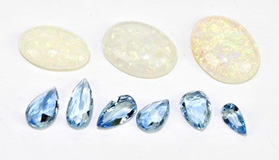 Lot 360 - Three unmounted opal cabochons, and several...