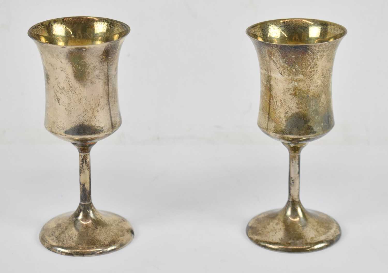 Lot 568 - TOYE, KENNING & SPENCER; a pair of hallmarked...