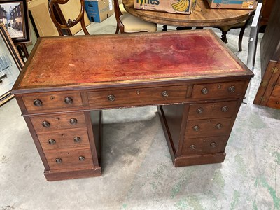 Lot 555 - A Victorian mahogany nine drawer twin pedestal...
