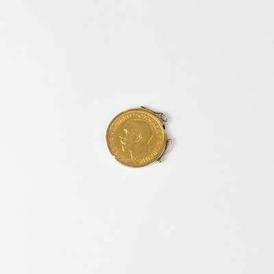 Lot 883 - A George V full sovereign 1915, in 9ct yellow...