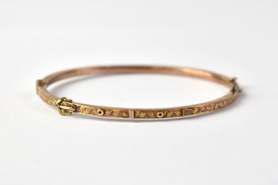 Lot 846 - A Victorian yellow metal buckle bangle, approx....