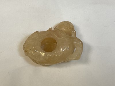 Lot 237 - A Chinese mottled jade brush washer in the...