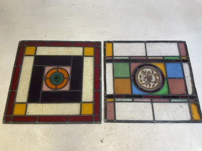 Lot 511 - Two leaded stained glass panels, each centred...