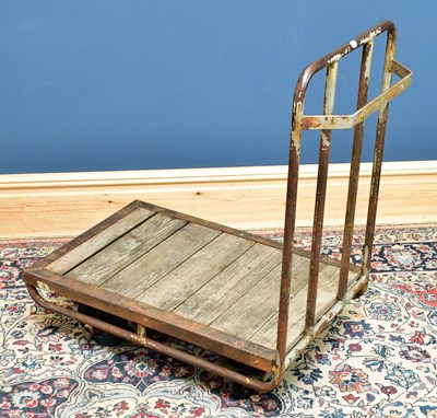 Lot 2377 - A wood and metal platform trolley, height 88cm,...