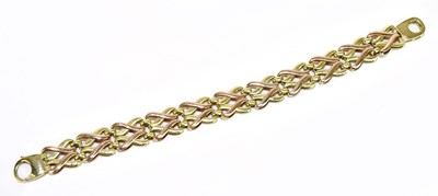 Lot 168 - A 9ct yellow and rose gold Celtic inspired...