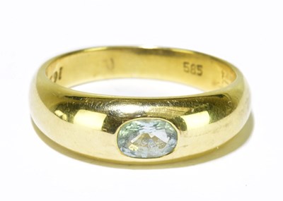 Lot 93 - A 14ct yellow gold ring with central rubover...