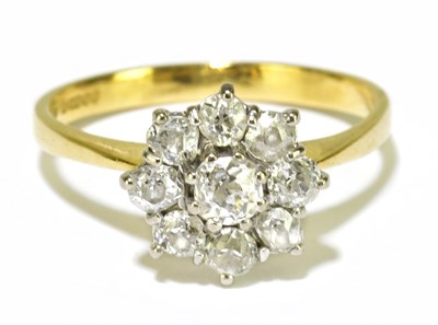 Lot 35 - An 18ct yellow gold and diamond flower head...