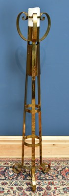 Lot 2336 - A brass church candle holder, height 130cm.