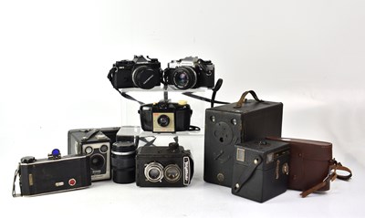 Lot 447 - A collection of cameras to include an Olympus...