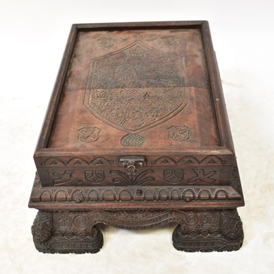 Lot 141 - A carved hardwood Bible box, the sliding cover...