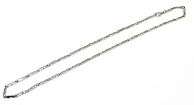 Lot 275 - A white metal necklace stamped 750 losar to...