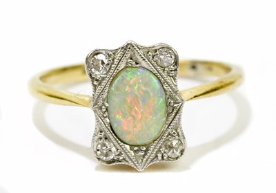 Lot 46 - An 18ct gold opal and diamond cluster ring,...