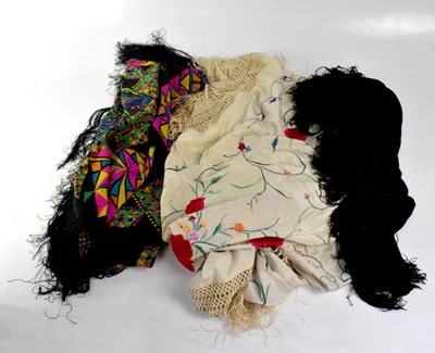 Lot 130 - Three Victorian and later evening shawls