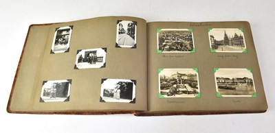 Lot 529 - An inter-war photograph album containing...