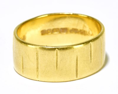 Lot 83 - A 22ct yellow gold wedding band, approx. 7.2g.