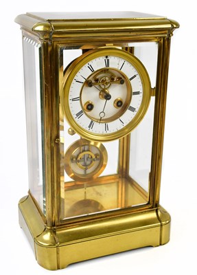 Lot 2274 - A French brass four glass mantel clock with...