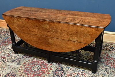 Lot 2517 - An 18th century oak gateleg dining table, 73cm...