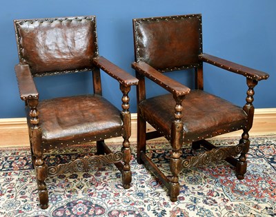 Lot 2526 - A pair of Charles II style oak open arm chairs,...