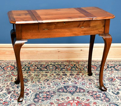 Lot 2441A - An early 20th century mahogany writing table,...