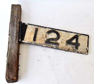 Lot 79 - RAILWAYANA; cast iron numberplate 124, 15 x 52cm.