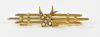 Lot 626 - A Victorian yellow metal bar brooch, with...