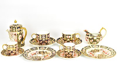 Lot 275 - ROYAL CROWN DERBY; a twelve-piece porcelain...