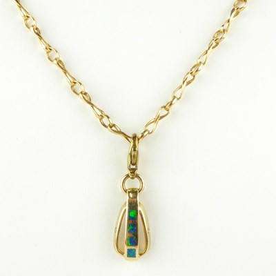 Lot 865 - A 14ct gold contemporary pendant with faux...