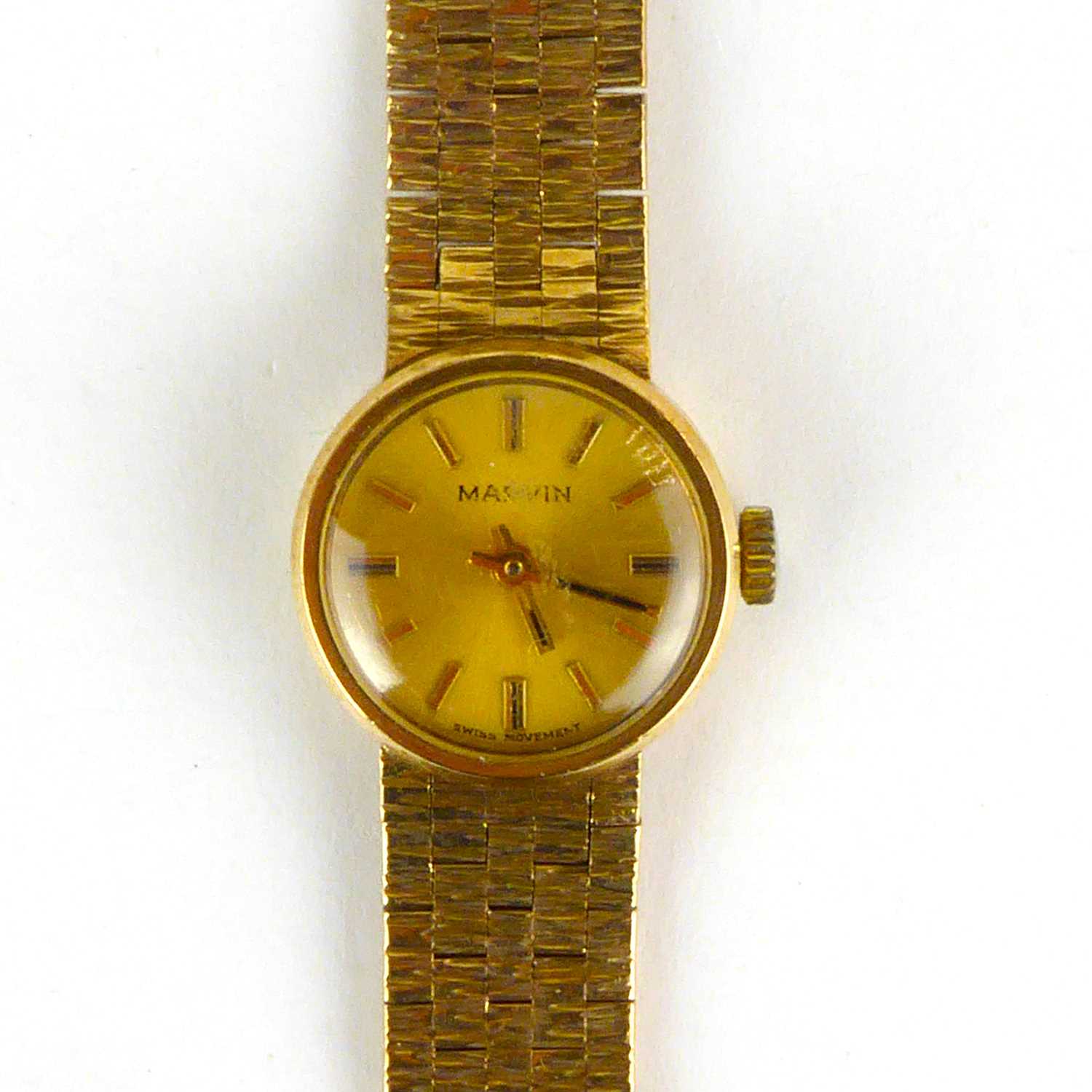 Lot 958 - MARVIN; a ladies' 9ct gold wristwatch, the...