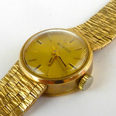 Lot 958 - MARVIN; a ladies' 9ct gold wristwatch, the...