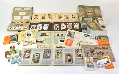 Lot 495 - A quantity of assorted cigarette cards, boxed...