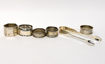 Lot 570 - A pair of Georgian hallmarked silver sugar...