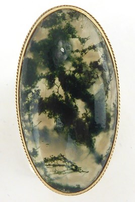 Lot 814 - A 9ct gold dress ring with large oval moss...