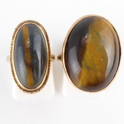 Lot 818 - Two 9ct gold tiger's eye rings, the largest...