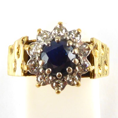 Lot 797 - An 18ct gold contemporary ring, with flower...