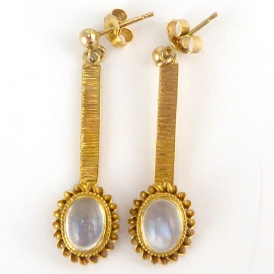 Lot 902 - A pair of vintage 1970s gold earrings with...