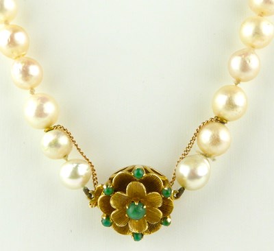 Lot 939 - A single strand of cultured pearls with 9ct...