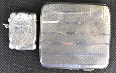 Lot 601 - A George V hallmarked silver pocket cigarette...