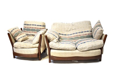 Lot 16 - ERCOL; an upholstered two-seater sofa and...