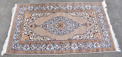 Lot 2366 - A hand knotted beige ground Keshan rug, 163 x...
