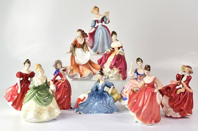 Lot 302 - ROYAL DOULTON; ten figures of ladies,...