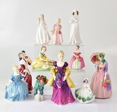 Lot 301 - ROYAL DOULTON; eleven figures of ladies of...