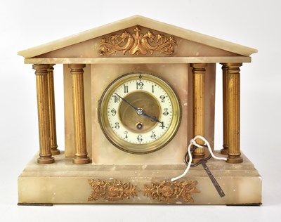 Lot 129 - An onyx and gilt metal mausoleum clock, the...