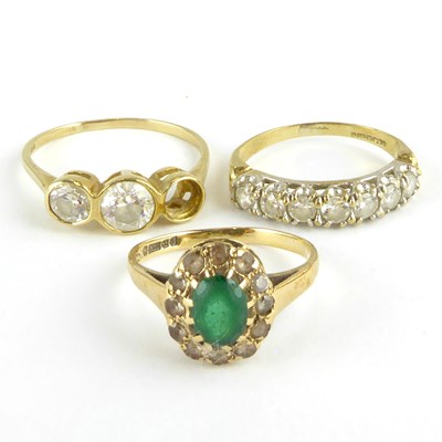 Lot 808 - Three 9ct gold dress rings comprising a half...