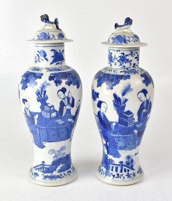 Lot 320 - A pair of Chinese blue and white baluster form...