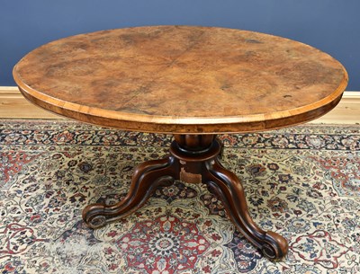 Lot 2494 - A Victorian walnut oval tilt-top loo table,...