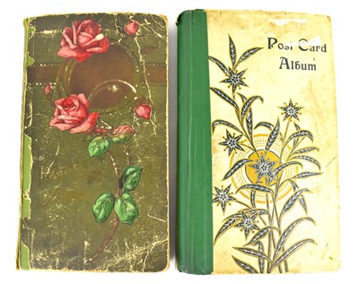 Lot 526 - Two early 20th century postcard albums, mixed...